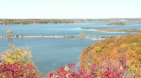 Car Crosses Between Lakes in Fall Season 스톡 동영상 12575653