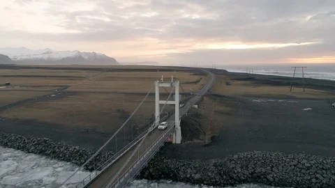 A Car Crossing Bridge at Diamond Beach in Iceland in 4K Stock Footage 89156203