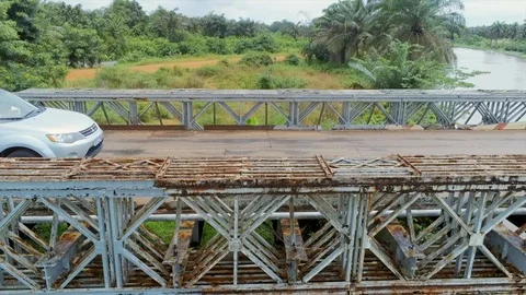 Car crossing old bridge Stock Footage 97982480
