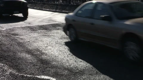 Car damaging large potholes on city streets Stock Footage 47856041