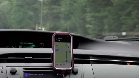 Car Dash Phone Showing Map GPS 4K Closeup Stock Footage 210857775