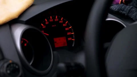 Car dashboard and steering wheel. Closeup shot of a black steering wheel of the Video stock 336265860