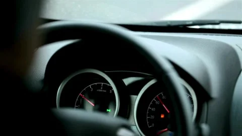 Car dashboard and steering wheel. Closeup shot of a black steering wheel of the Stock-Footage 336265936