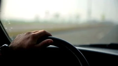 Car dashboard and steering wheel. Closeup shot of a black steering wheel of the Stock-Footage 336266206