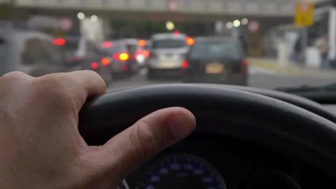 Car dashboard and steering wheel. Closeup shot of a black steering wheel of the Stock-Footage 336266245