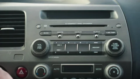 Car dashboard with cd display shown as driver turns off vehicle power Stock-Footage 310183113