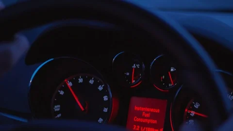 Car dashboard, control panel during automobile drive at dusk Stock Footage 103150142