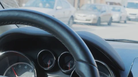 Car dashboard during car driving on street with houses, cars Video stock 106019914