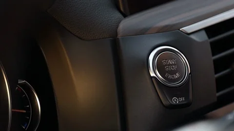 Car dashboard with focus on engine start stop button. Car interior details. Keyl Stock Footage 121251960