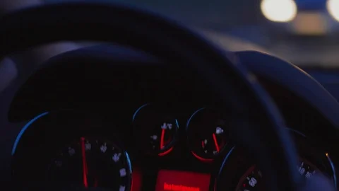 Car dashboard, hands on steering wheel and traffic lights Stock Footage 104195537