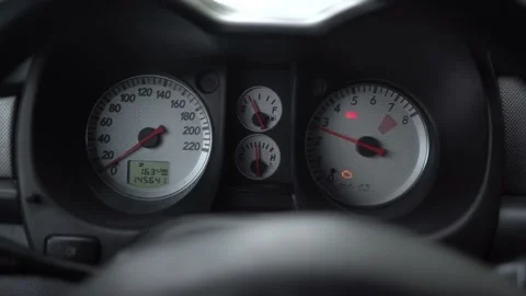 Car dashboard with indicators and gauges. RPM increase on the tachometer. Error Stock Footage 198762400