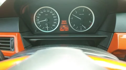 Car dashboard showing increasing speed and engine rpm Stock Footage 304061354