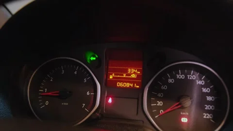 Car dashboard speedometer and tachometer during engine start Stock Footage 322516963