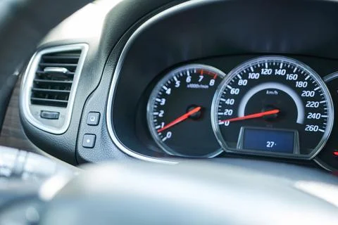 Car dashboard with speedometer, speedometer and tachometer. Stock Photos