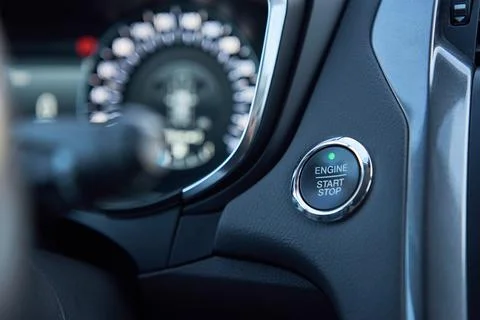Car dashboard with start engine button on panel Stock Photos