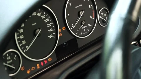 Car dashboard turns on at startup close-up Video stock 151157286
