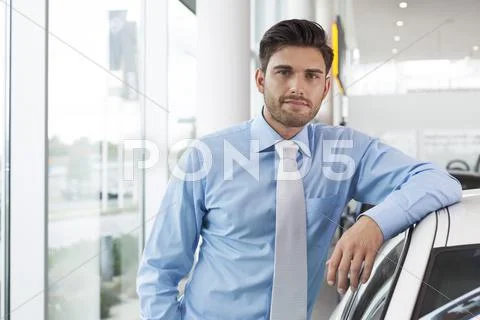 At The Car Dealer, Man Leaning At New Car