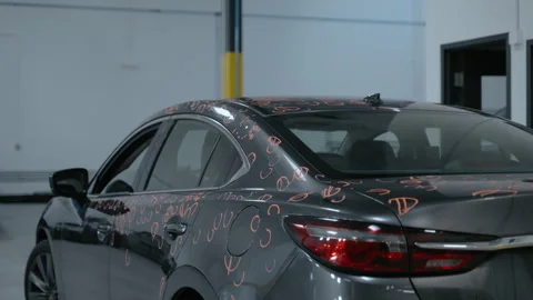 Car with dent marks in to Preparing process of Repairing Hail Damage in PDR car Stock Footage 335966593