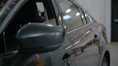 Car with dent marks in to Preparing process of Repairing Hail Damage in car Stock Footage 335966613