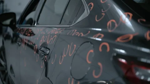 Car with dent marks in to Preparing process of Repairing Hail Damage in car Stock Footage 335966614