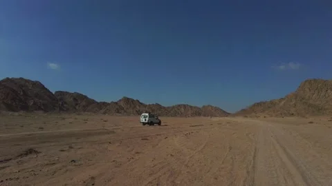 Car in a desert Stock Footage 157876868