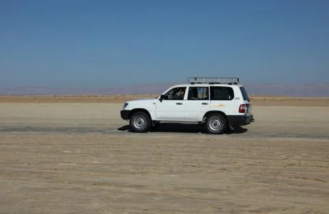 Car in desert Stock Photos