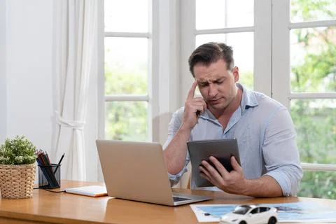 Car design engineer analyze car model prototype. Synchronos Stock Photos