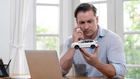 Car design engineer analyze car model prototype. Synchronos Stock Photos