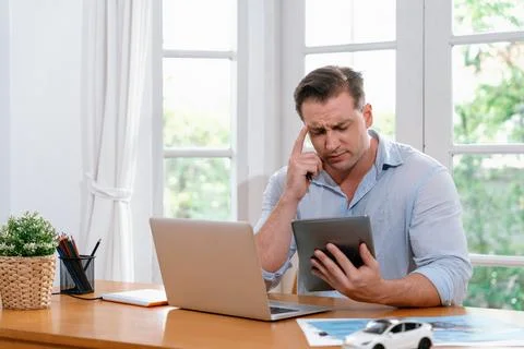 Car design engineer analyze car model prototype. Synchronos Stock Photos
