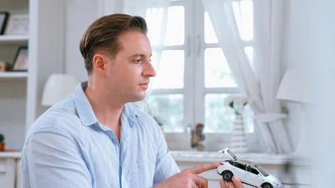 Car design engineer analyze car model prototype. Synchronos Stock Photos