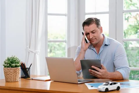 Car design engineer analyze car model prototype. Synchronos Stock Photos