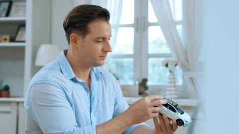 Car design engineer analyze car model prototype. Synchronos Stock Photos