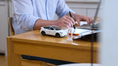 Car design engineer working on car prototype for automobile business Synchronos Stock Photos