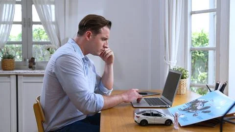 Car design engineer working on car prototype for automobile business Synchronos Stock Photos