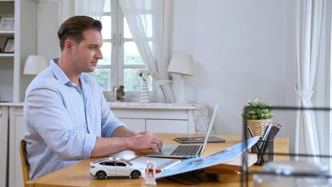 Car design engineer working on car prototype for automobile business Synchronos Stock Photos
