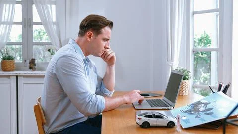 Car design engineer working on car prototype for automobile business Synchronos Stock Photos