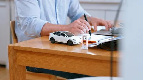 Car design engineer working on car prototype for automobile business Synchronos Stock Photos