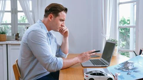 Car design engineer working on car prototype for automobile business Synchronos Stock Photos