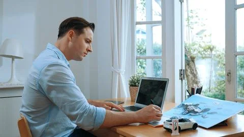 Car design engineer working on car prototype for automobile business Synchronos Stock Photos