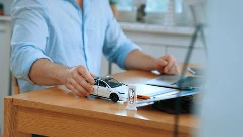 Car design engineer working on car prototype for automobile business Synchronos Stock Photos