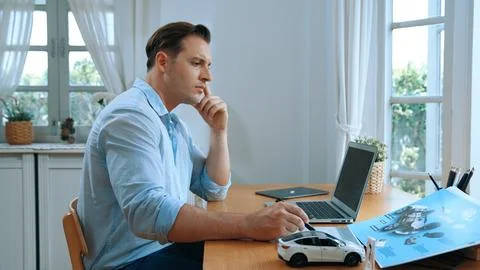 Car design engineer working on car prototype for automobile business Synchronos Stock Photos