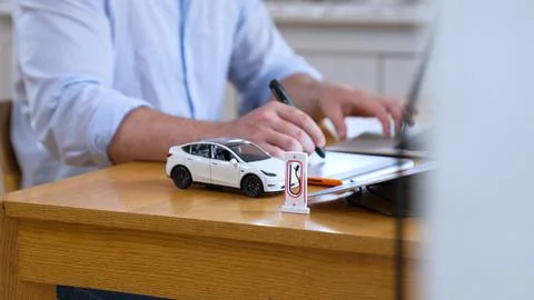 Car design engineer working on car prototype for automobile business Synchronos Stock Photos