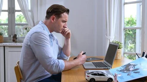 Car design engineer working on car prototype for automobile business Synchronos Stock Photos