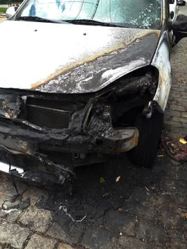 Car destroyed by a fire Stock Photos