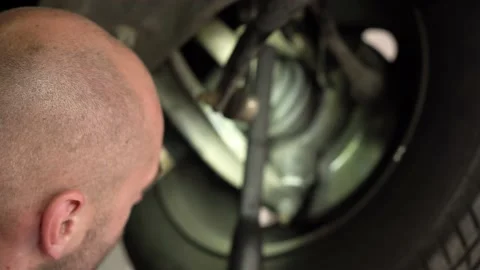 Car diagnostics. an auto mechanic inspects a car. auto repair shop. close-up Stock Footage 204878759