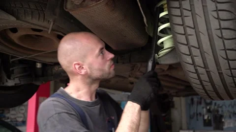 Car diagnostics. auto mechanic inspects a car. auto repair shop. close-up Stock Footage 204878840