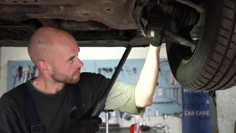 Car diagnostics. an auto mechanic inspects a car. auto repair shop. breaking. Video stock 204878902