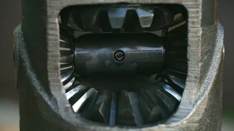 Car differential gears rotating inside car transmission Stock Footage 313643035