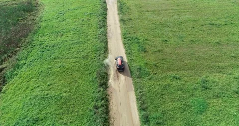Car on dirty road Stock Footage