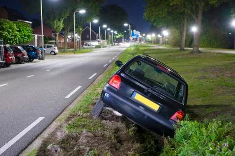 Car in ditch Stock Photos
